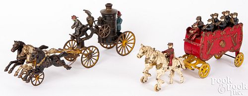 TWO CAST IRON HORSE DRAWN WAGONSTwo