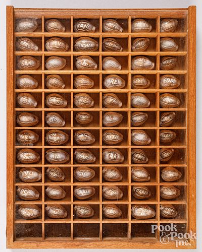 COLLECTION OF CARVED SOUVENIR COWRIE