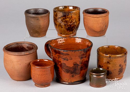 EIGHT PIECES OF REDWARE, 19TH C.Eight