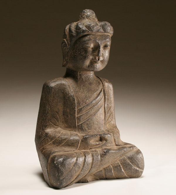 Carved stone Buddha sculpture.