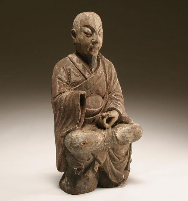 Carved wooden Buddha sculpture;