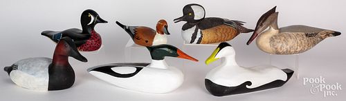 SEVEN CARVED AND PAINTED DUCK DECOYS,