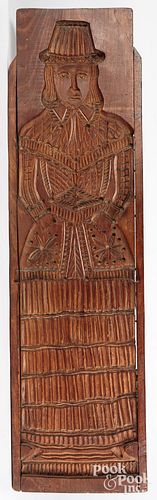 LARGE CARVED WOOD CAKEBOARD, 19TH C.Large