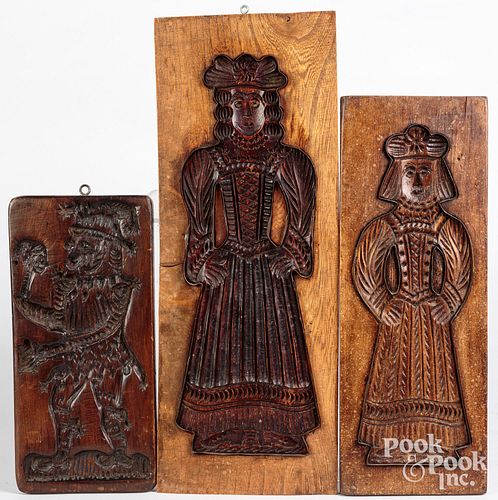 THREE CARVED CAKEBOARDSThree carved 30f497
