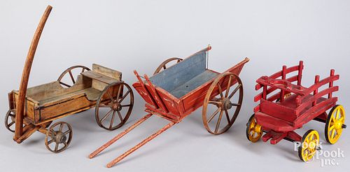 THREE WOODEN TOY WAGONS AND CART,