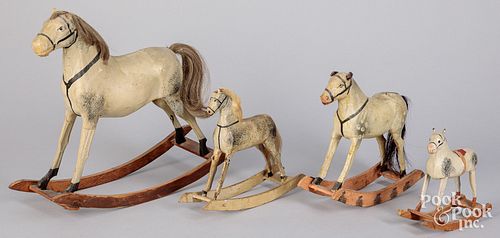 FOUR GRADUATED CARVED ROCKING HORSE 30f4d7