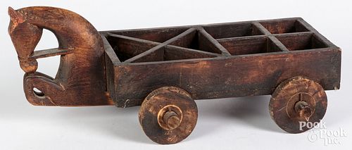 PRIMITIVE CARVED RUNNING HORSE WAGON,
