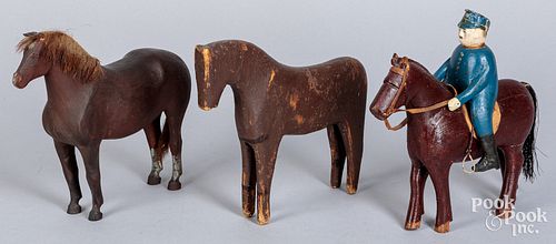 THREE CARVED AND PAINTED HORSES,