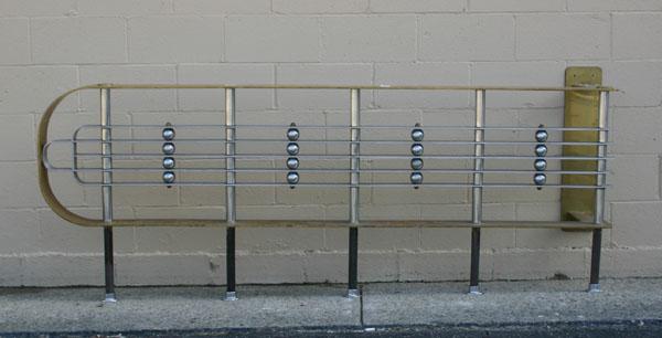 Art deco metal stair railing; bronze