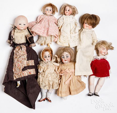 SEVEN SMALL BISQUE DOLLS, 19TH