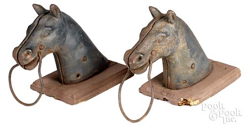 PAIR OF CAST IRON HORSE HEAD HITCHING