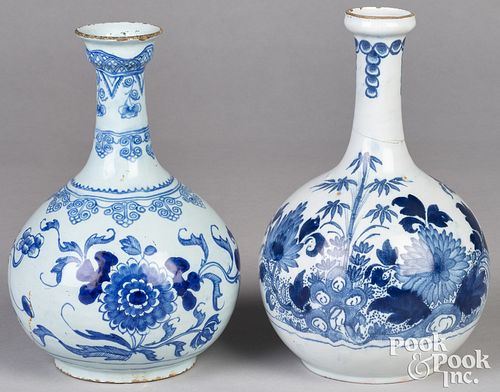TWO DELFTWARE BLUE AND WHITE BOTTLES,