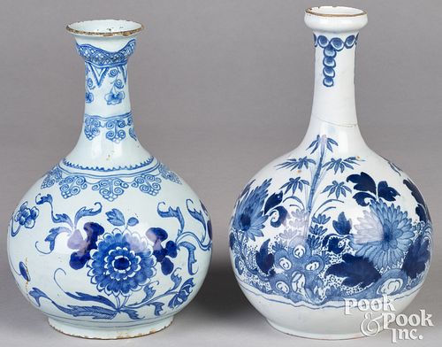 TWO DELFTWARE BLUE AND WHITE BOTTLES  30f8af