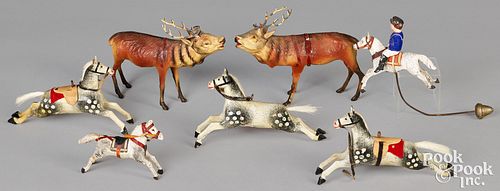 FOUR STICK LEG HORSE TOYS AND TWO REINDEERFour