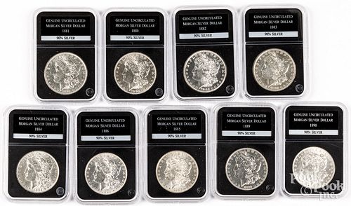 NINE UNCIRCULATED MORGAN SILVER