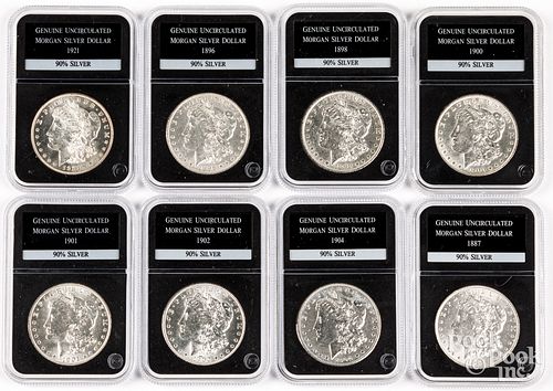 EIGHT UNCIRCULATED MORGAN SILVER