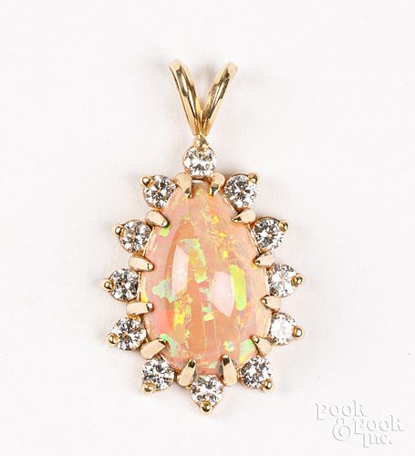 14K GOLD, DIAMOND, AND STONE PENDANT,