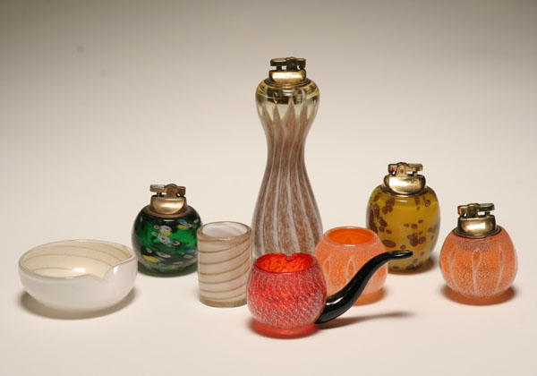 Eight Murano art glass table lighters,