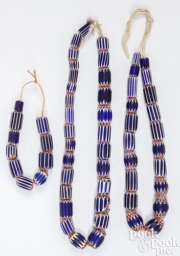 THREE STRANDS OF TRADE BEAD NECKLACESThree 30d951
