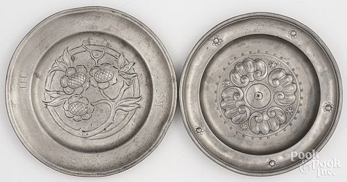 TWO PEWTER PLATES WITH FLORAL DECORATION,