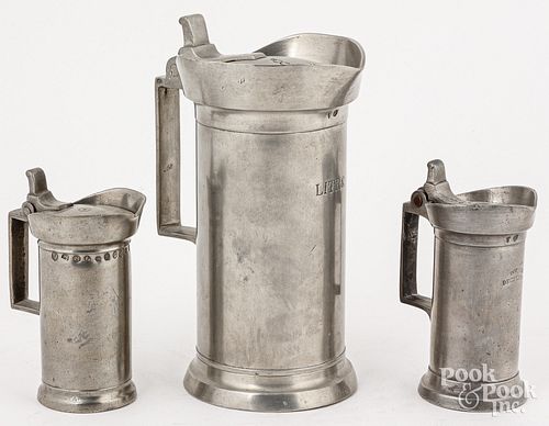 THREE FRENCH PEWTER LIDDED MEASURES,