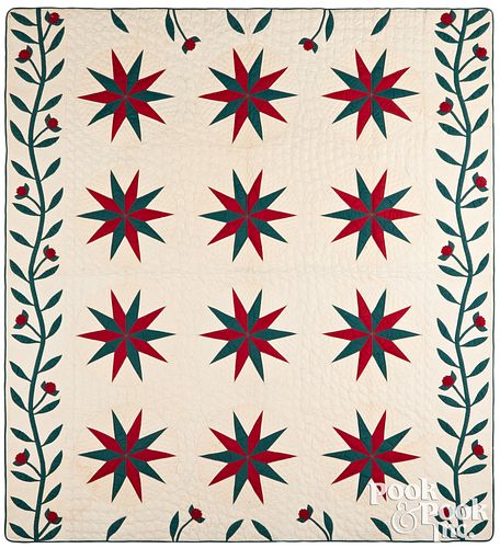 STAR PATTERN QUILT WITH ROSE BORDER,