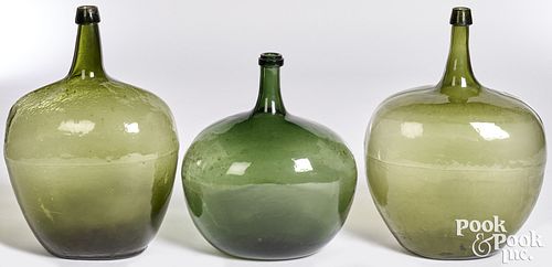 THREE OLIVE GLASS DEMIJOHN BOTTLES,