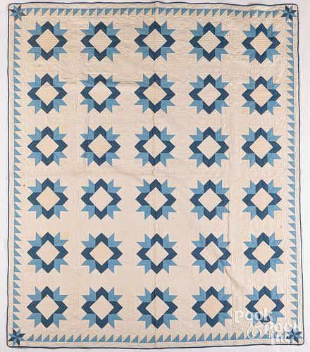 BLUE AND WHITE PATCHWORK QUILT,