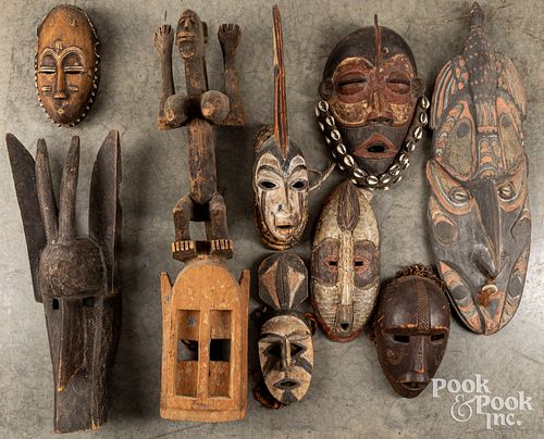 AFRICAN CARVED MASKS AND FIGURES.African