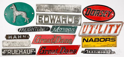 COLLECTION OF TRUCKING SIGNS/EMBLEMS