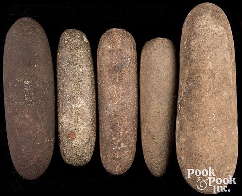 FIVE PREHISTORIC STONE PESTLESFive 310c2b