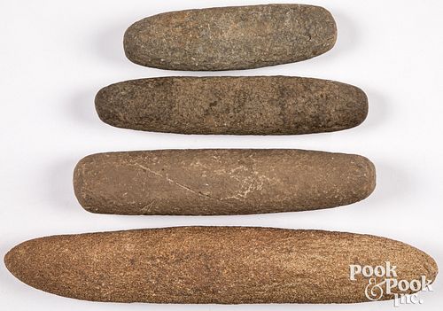 FOUR ANCIENT STONE PESTLESFour