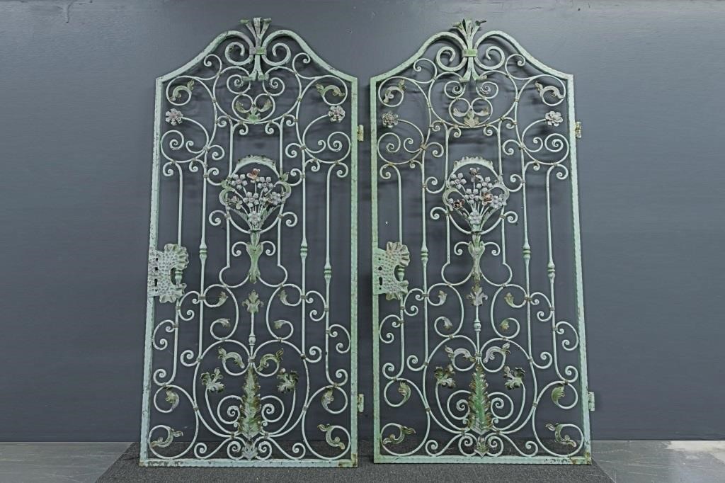 Monumental pair of ornate metal gates,