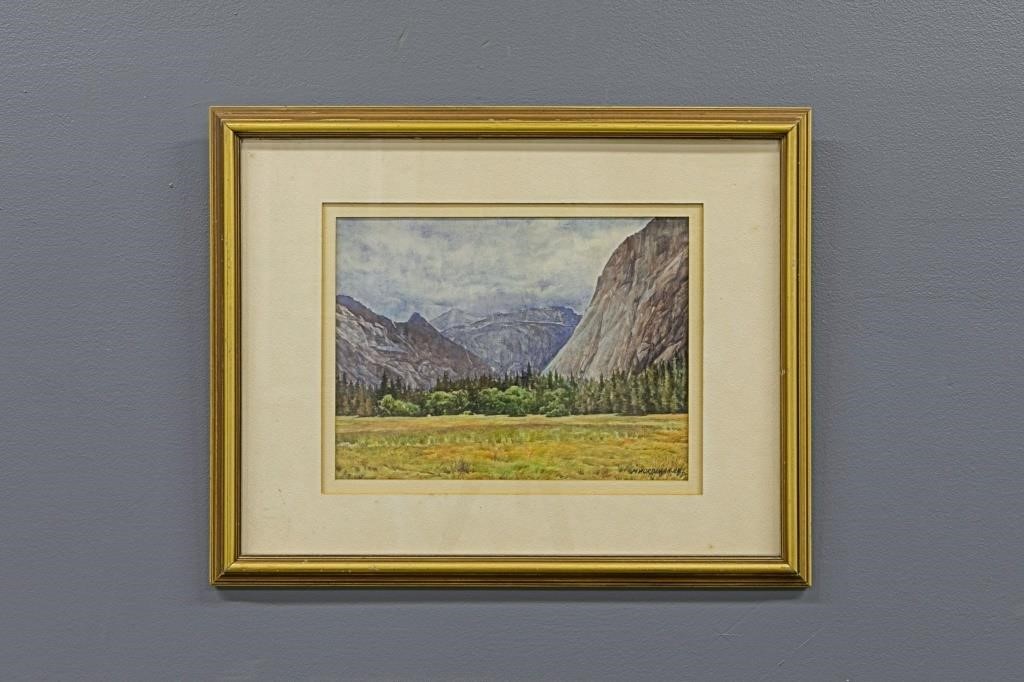 Framed and matted watercolor of mountains