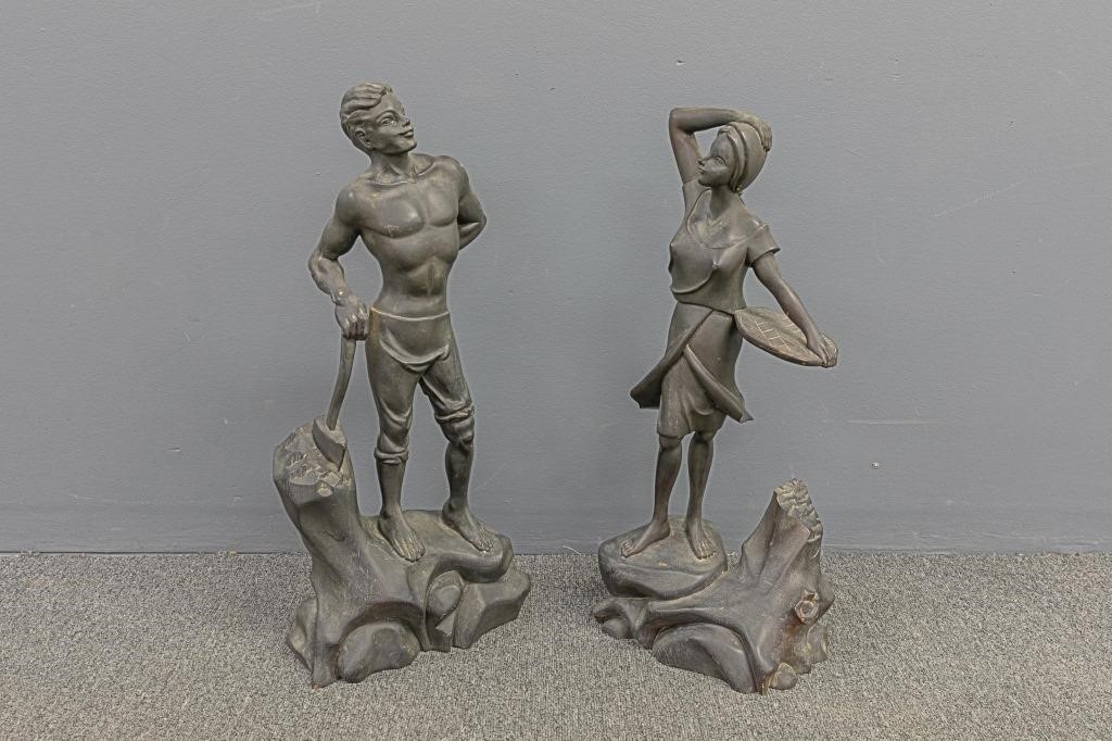 Two carved wood figures in the style