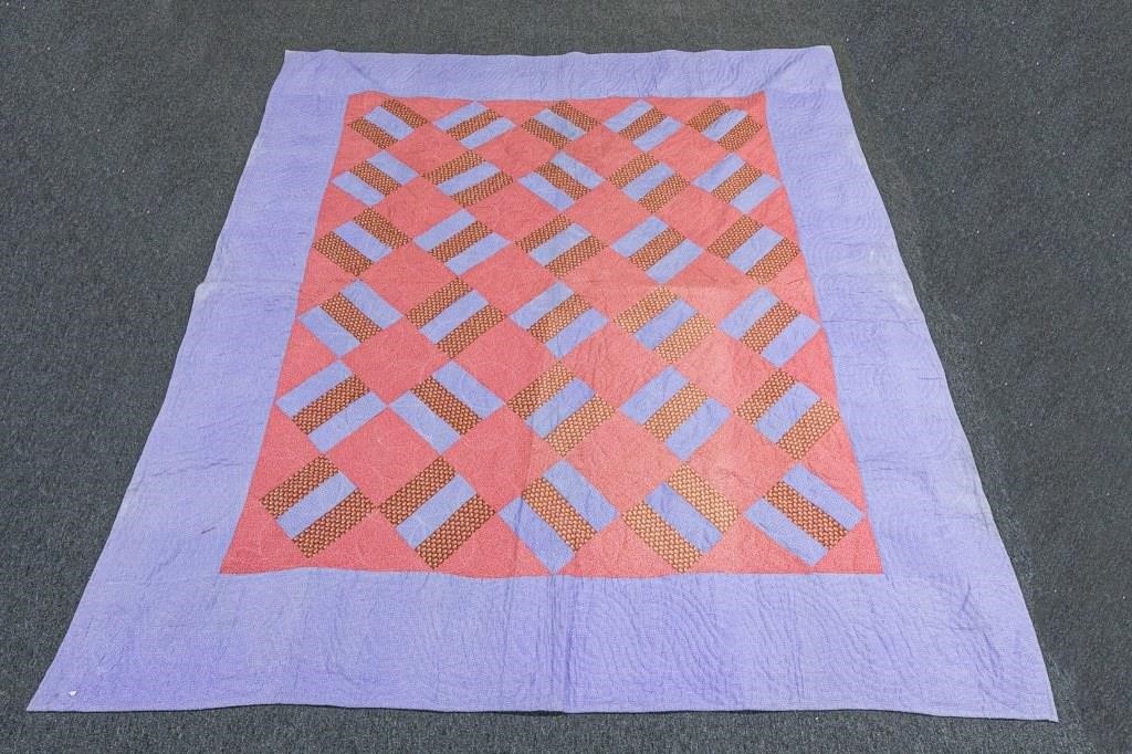 Pieced quilt with blue border
90"L