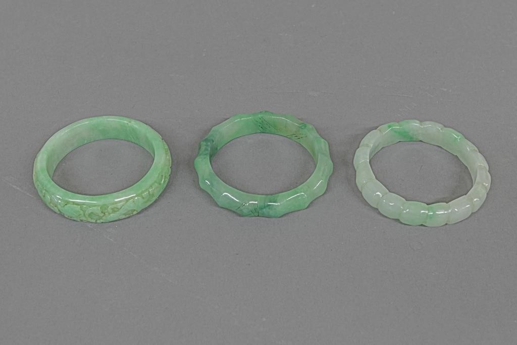 Three Chinese carved green jade