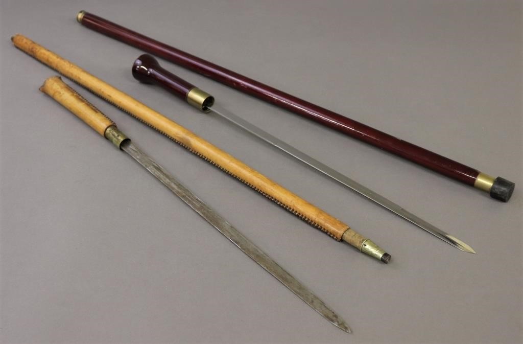 Two sword canes, one in stitched leather,