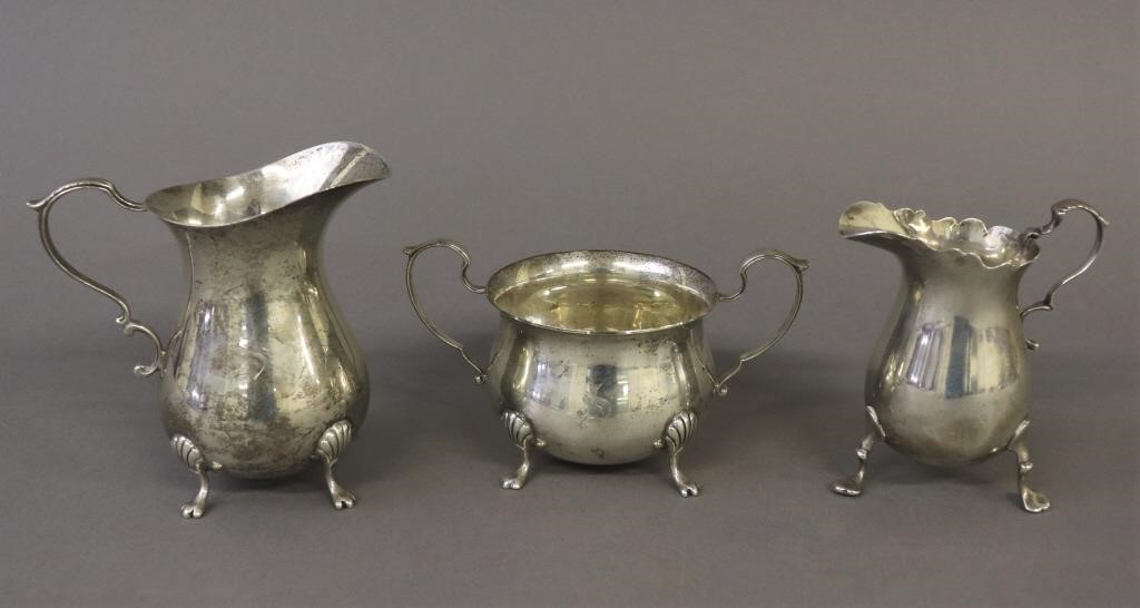 Two sterling silver creamers and