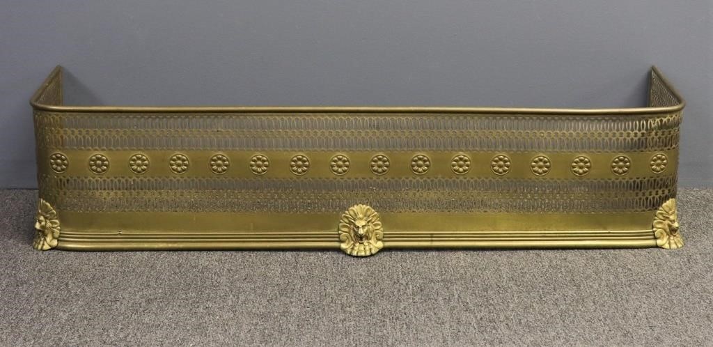 Pierced brass fire fender with lion