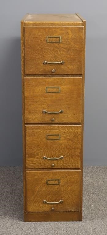 Oak file cabinet, circa 1900, 53"h
