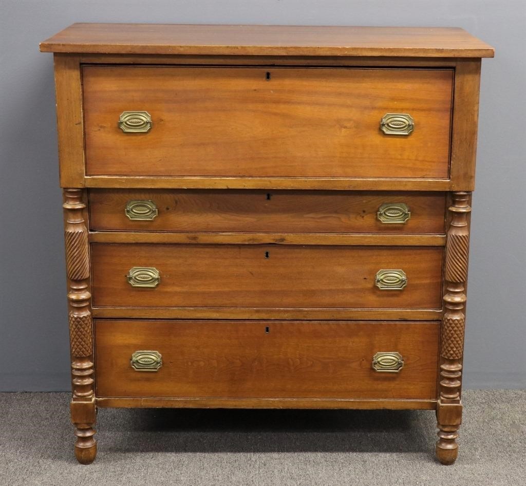 Empire cherry bureau with carved
