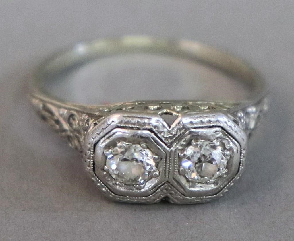 Platinum double diamond ring with