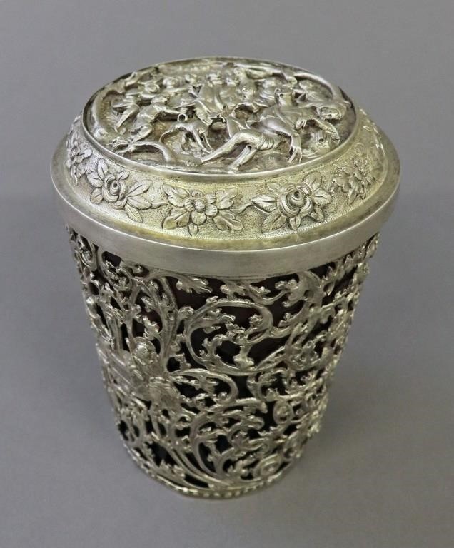 Glass beaker sheathed in German silver,
