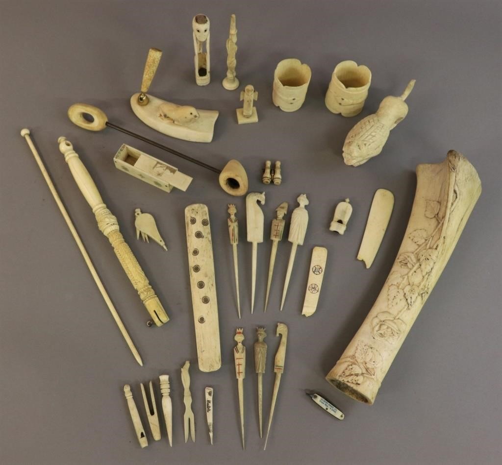 Carved bone objects including 3112e8