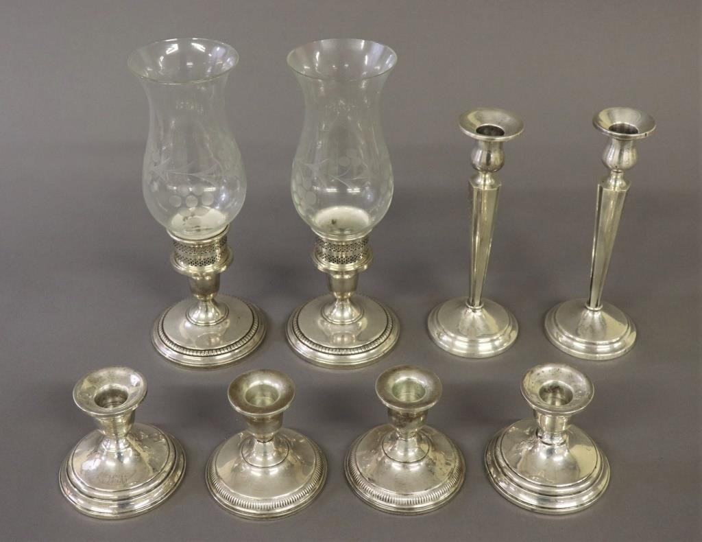 Sterling silver weighted candlesticks,