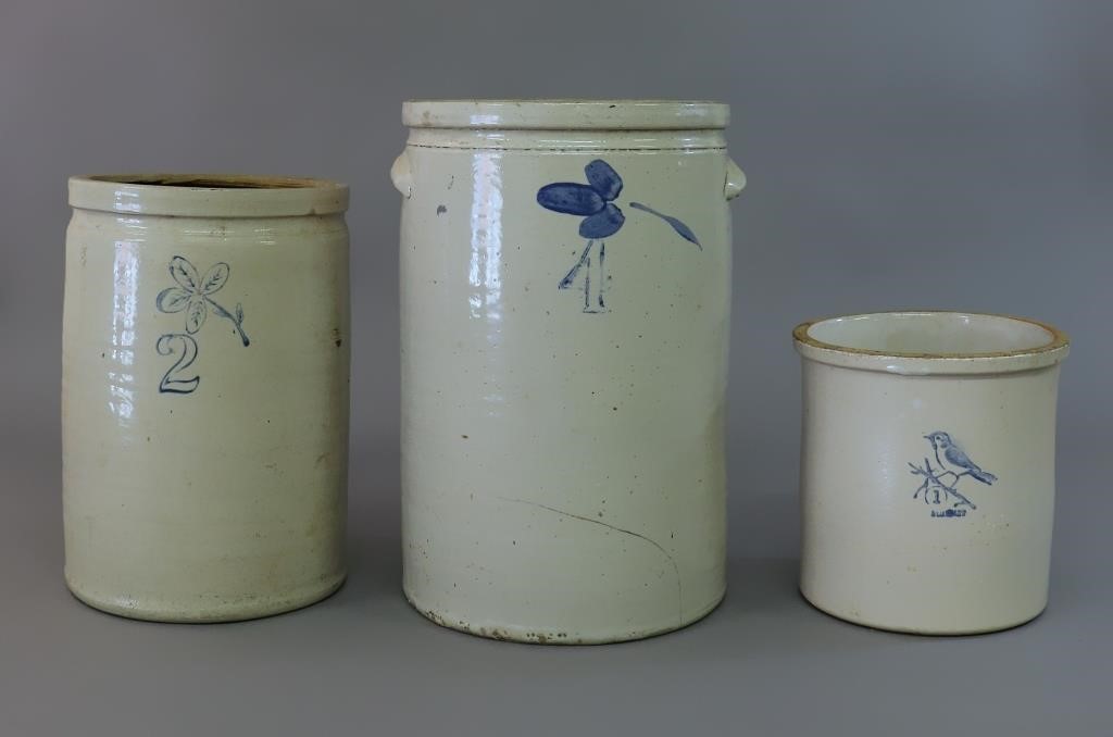 Three stoneware crocks, largest