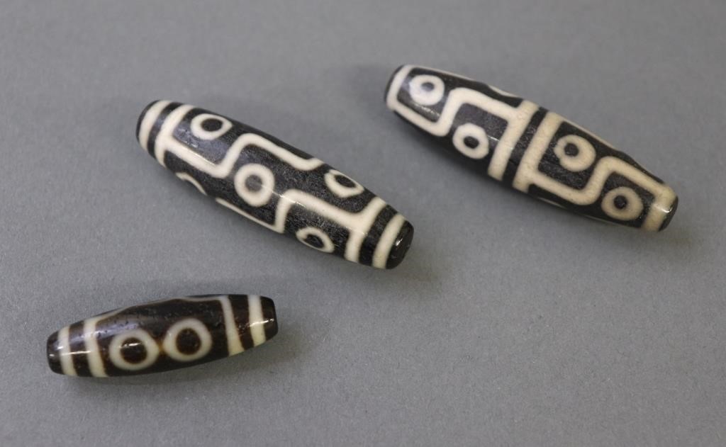 Three Tibetan dzi beads to include 31145f