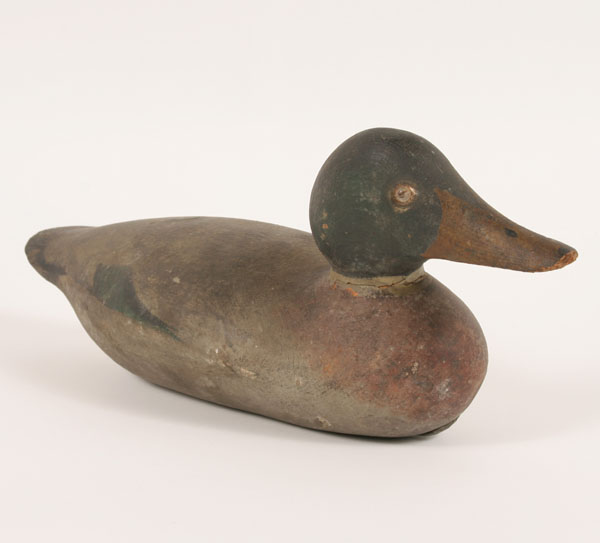 Painted carved wood duck decoy with