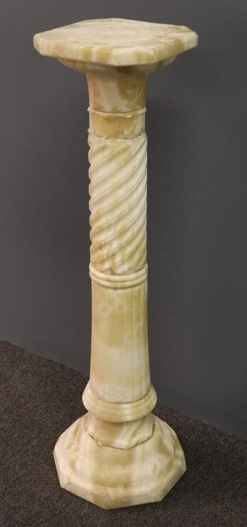 Carved alabaster column form pedestal,